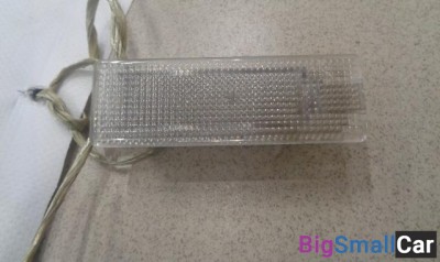 Фонарь подсветки номера от Volkswagen Golf 6 2008-2013