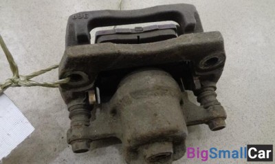 Суппорт задний левый от Mazda CX-7 2006-2012