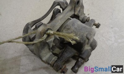 Суппорт передний правый от Opel Corsa D 2006-2014