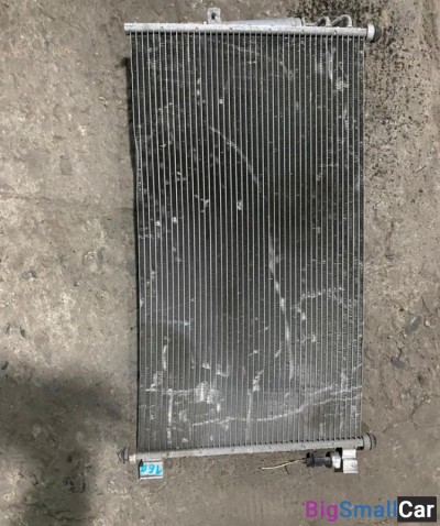 Радиатор кондиционера Nissan Tiida